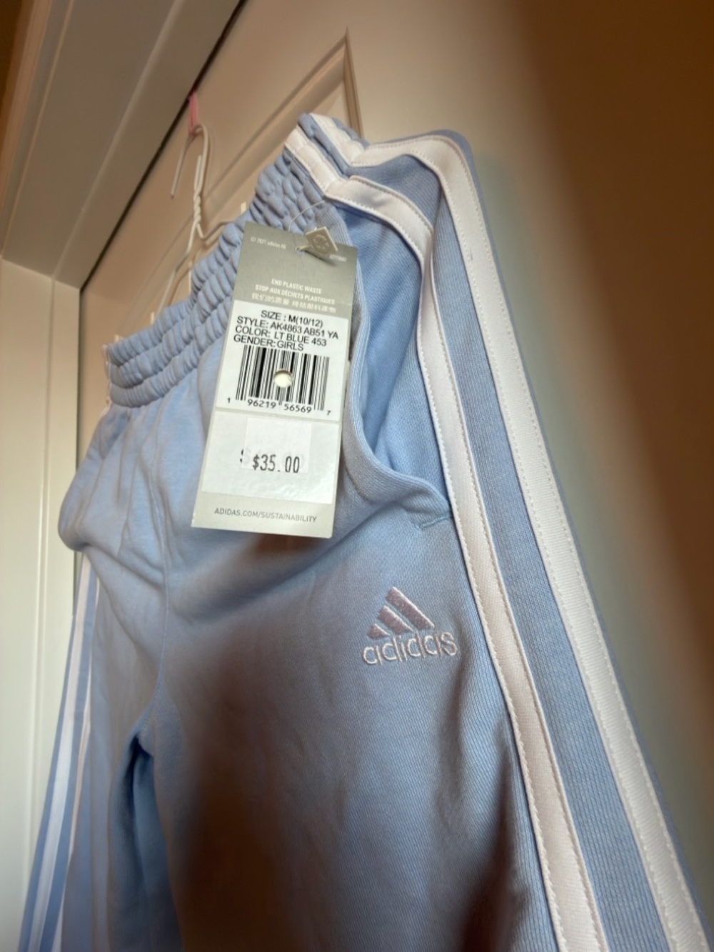 adidas Pastel Blue Track Pants with White Three Stripes